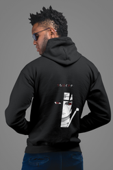 a man with dreadlocks wearing a black hoodie