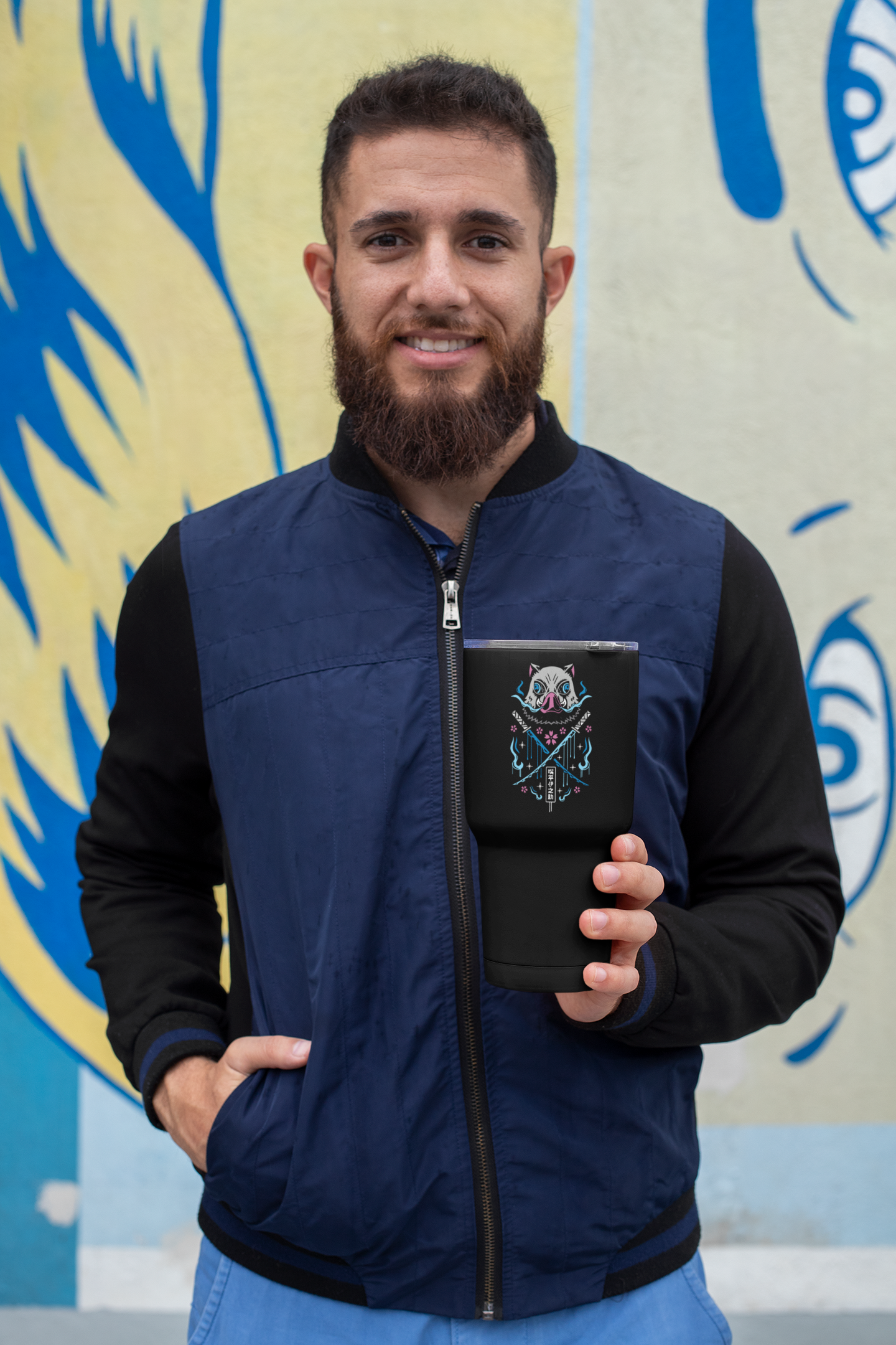 a man with a beard holding a tablet