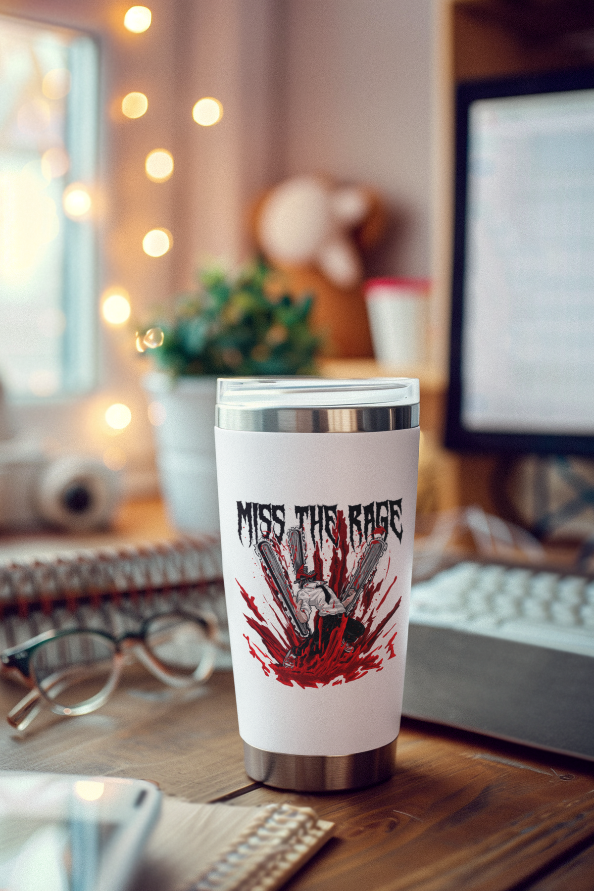 a coffee cup sitting on top of a wooden desk