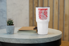 a white coffee cup sitting on top of a table